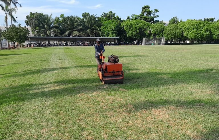 renovasi lapangan bola tanah